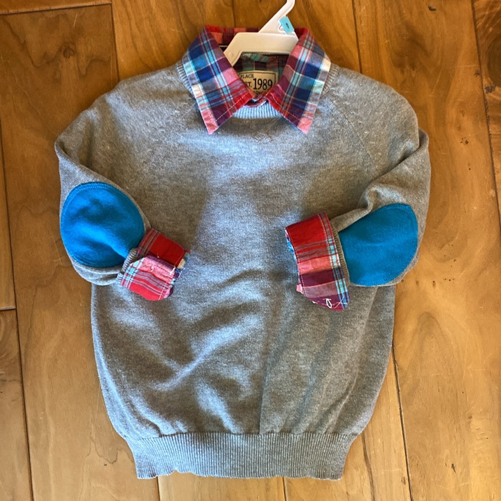 Red plaid Button down shirt and gray sweater set.